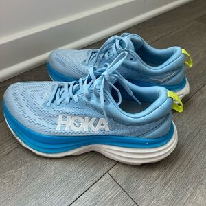 Hoka Sky Blue Running Shoes with Yellow Accents